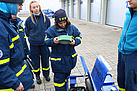 Train the Trainer-Ausbildung Elektrotechnik - Umgang mit dem Stromerzeuger und Beleuchtungsaufbau (Bild: Dieter Seebach/THW Augsburg)